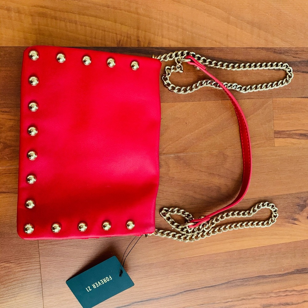 Red studded crossbody bag
